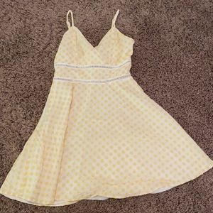 Cute white sundress with bright yellow flowers
